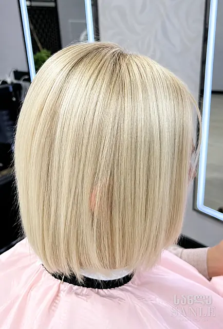 Hair lightening result at SANLE — blonde bob, back view
